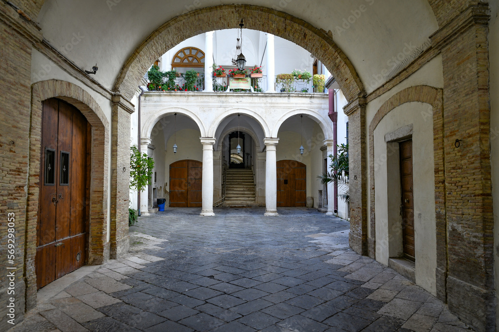 The courtyard of a noble palace located in Lucera, an ancient Apulian town in the province of Foggia, Italy..