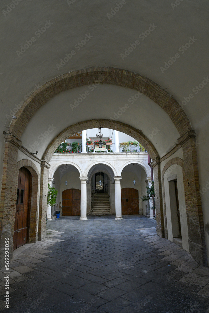 The courtyard of a noble palace located in Lucera, an ancient Apulian town in the province of Foggia, Italy..