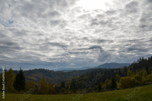 Beautiful morning cloudy autumn day is in mountain landscape. Carpathians, Travel at Ukraine. Beauty of nature concept