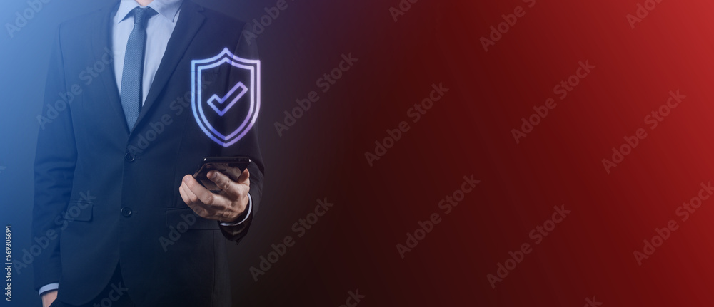 Protection network security computer in the hands of a businessman. business, technology, cyber security and internet concept - businessman pressing shield button on virtual screens Data protection Protection network security computer in the hands of a businessman. business, technology, cyber security and internet concept - businessman pressing shield button on virtual screens Data protection