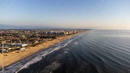 Landscape of a beach city with waves 