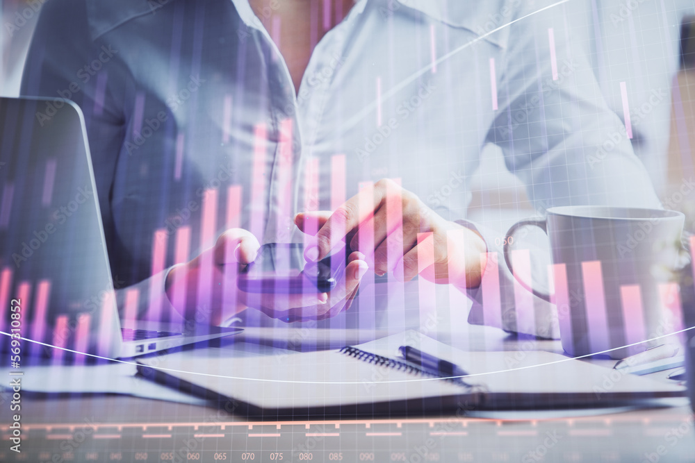 Double exposure of forex chart sketch hologram and woman holding and using a mobile device. Financial market concept.
