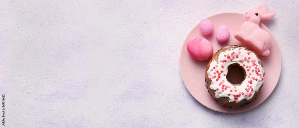 Tasty Easter cake, painted eggs and toy bunny on light background with space for text Tasty Easter cake, painted eggs and toy bunny on light background with space for text