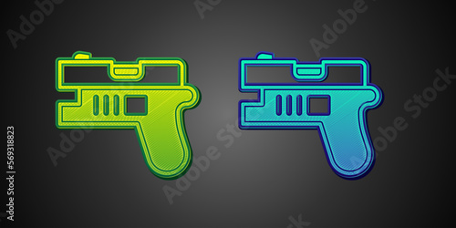 Green and blue Futuristic space gun blaster icon isolated on black background. Laser Handgun. Alien Weapon. Vector