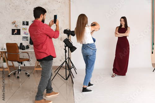 Female photographer and her...