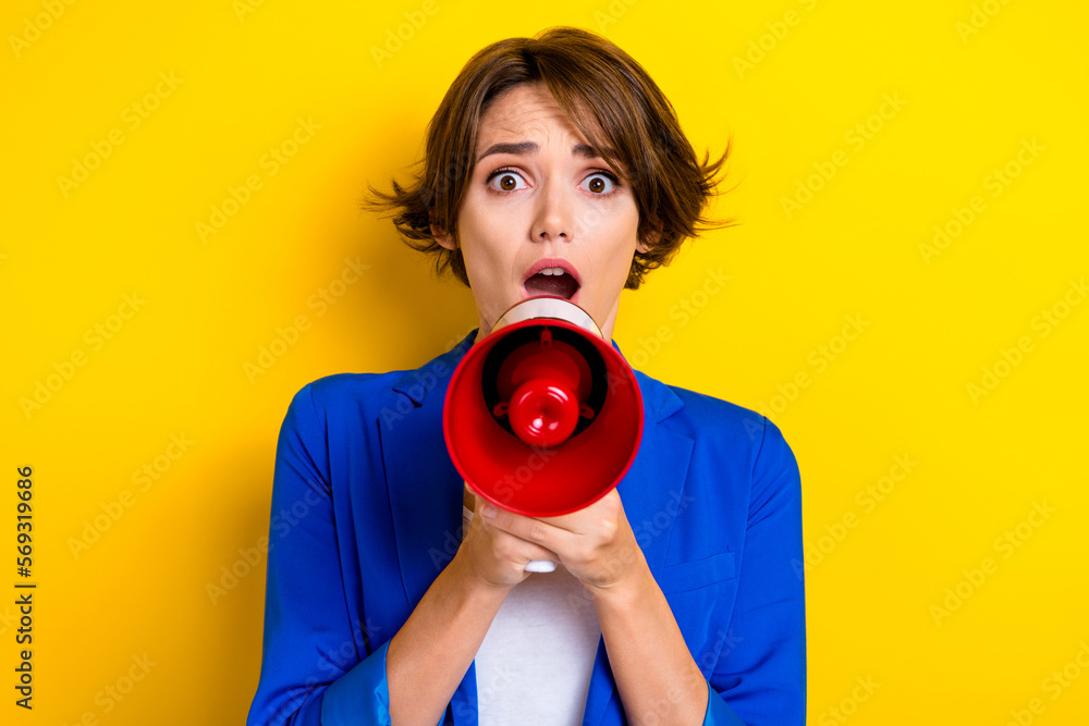 Obraz premium Photo of fear business lady scream bullhorn announce unbelievable news message isolated on bright color background