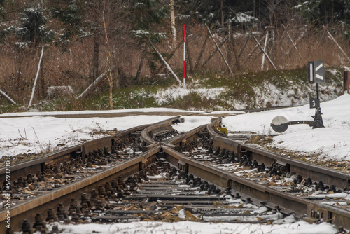 Narrow gauge railway in Ceska Kanada mountains in south Bohemia in winter