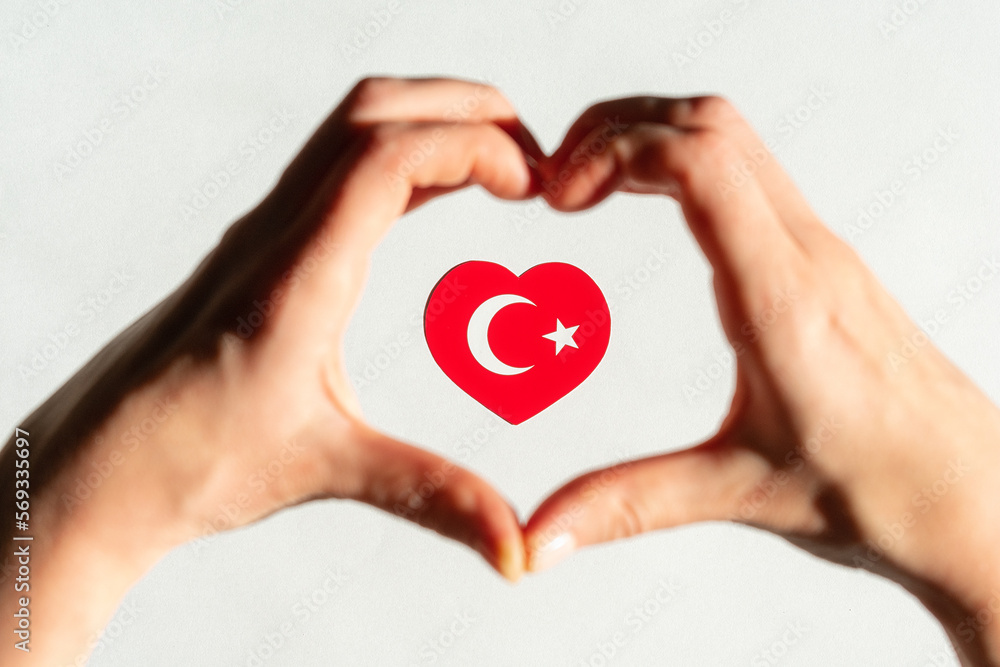 Turkish flag in the form of a heart inside a heart from the hands Turkish flag in the form of a heart inside a heart from the hands