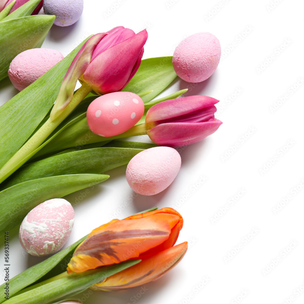 Fototapeta premium Beautiful tulip flowers and Easter eggs on white background