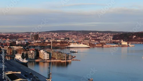 Aerial drone shot of central part of Oslo, Norway (Aker Brygge, Filipstad) at sunset