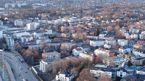 Aerial drone shot of central part of Oslo, Norway (Aker Brygge, Filipstad) at sunset