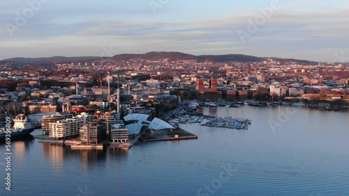 Aerial drone shot of central part of Oslo, Norway (Aker Brygge, Filipstad) at sunset