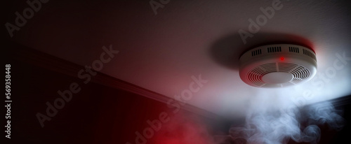 Fire alarm and smoke detector on the ceiling in the smoke, connected and in use. Space for text, message, advertisement. Generative AI photo