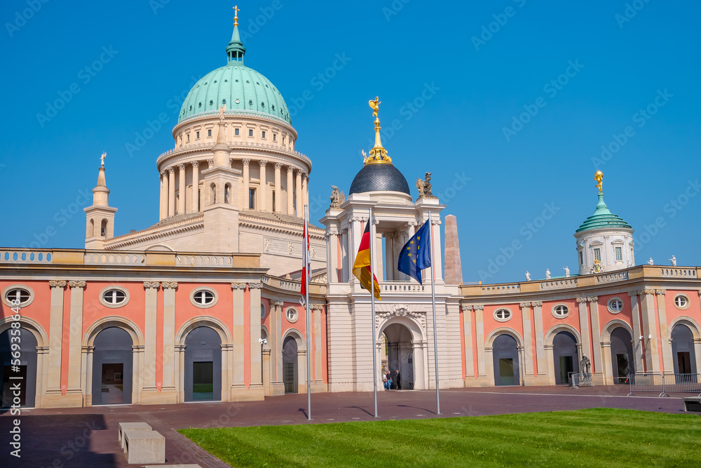 Saint Nicholas Church at Old Market square in the historical downtown with blue sky and sunny day, Potsdam, Germany.