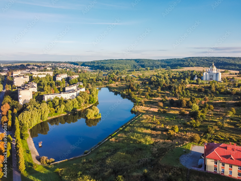 Aerial vIew of city Novyy Rozdil by drone. Summer Ukraine Lviv region, West Ukraine.Lake.