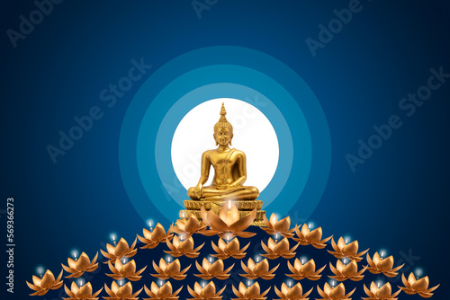 Buddha statue and candle in golden lotus on blue background.