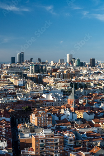 Madrid, Spain. April 6, 2022: Panoramic city landscape with beautiful blue sky. © camaralucida1