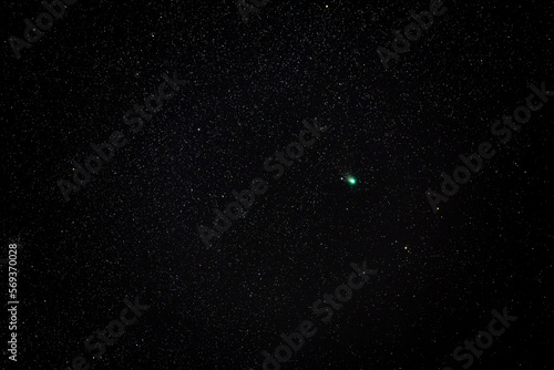 The green comet C/2022 E3 (ZTF) in the constellation Auriga tracked 25 seconds at ISO 2500 in the cold winter night sky with 200mm f2.8 lens, near Darmstadt on February 7th 2023, Germany photo