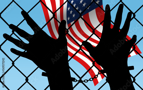 Hands in handcuffs rest on a chainlink fence with a USA flag in the background in a 3-d illustration about being detained at the USA and Mexico border. photo