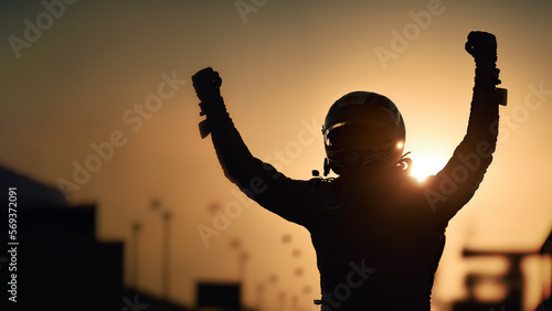 Silhouette of race car driver celebrating the win, gran prix. digital art 