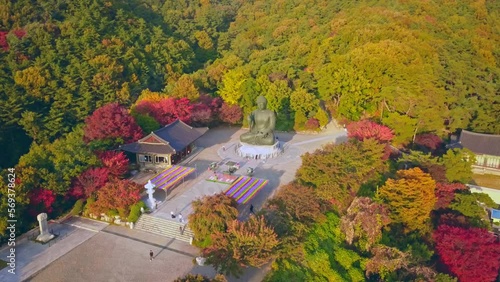 Aerial video of Gakwonsa temple during Autumn season in Cheonan city, South Korea. Aerial shot from drone. photo