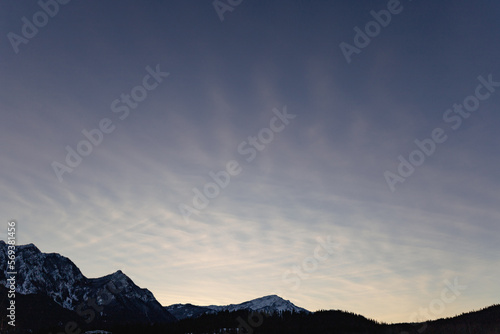 Sky Background of Cirrus Clouds Above Mountain Range