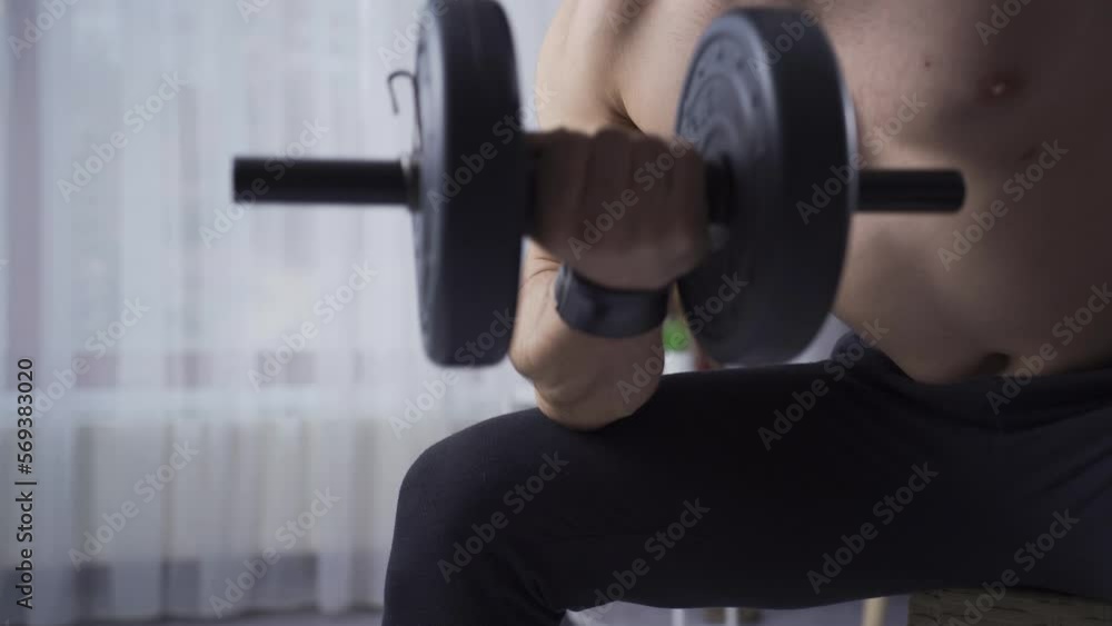 Young bodybuilder man working out with the help of dumbbells to enlarge his arm muscles.
The muscular man works with the help of dumbbells to make his arm muscles look bigger and more beautiful.
Young bodybuilder man working out with the help of dumbbells to enlarge his arm muscles.
The muscular man works with the help of dumbbells to make his arm muscles look bigger and more beautiful.