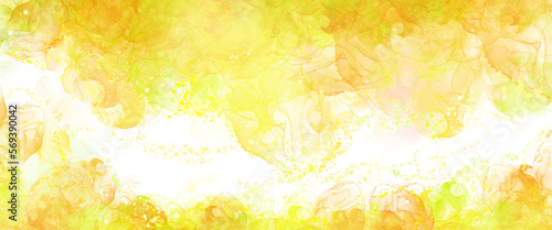 黄色のアルコールインクを使った背景素材　金色の飛沫やにじみ
