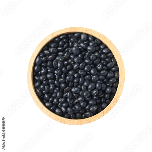 Black soy bean seeds in a wooden bowl, organic cereal food ingredient