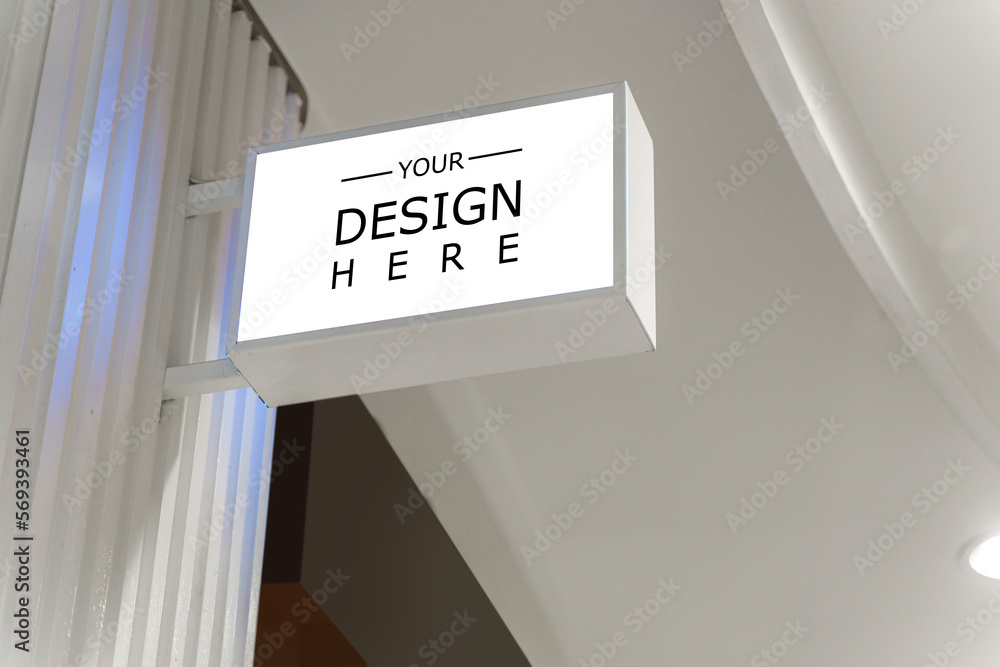 White signage mockup on a wall. Mockup sign outside of a shop. White ...