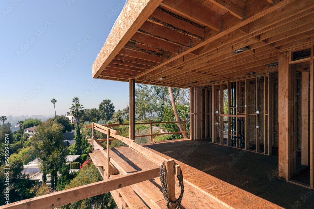Modern wood and steel framed structure with wooden safety rails