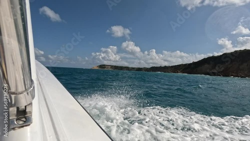 POV-Passing the uninhabited Tintamarre Island near the island of St Martin in the Leeward Island chain in the Caribbean Sea. It sits between the Caribbean and the Atlantic Ocean photo