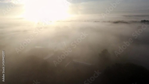 flying through the fog abov the clouds photo