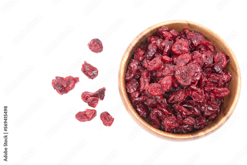 Top view of dried cranberries in wooden bowl isolated on white background Top view of dried cranberries in wooden bowl isolated on white background