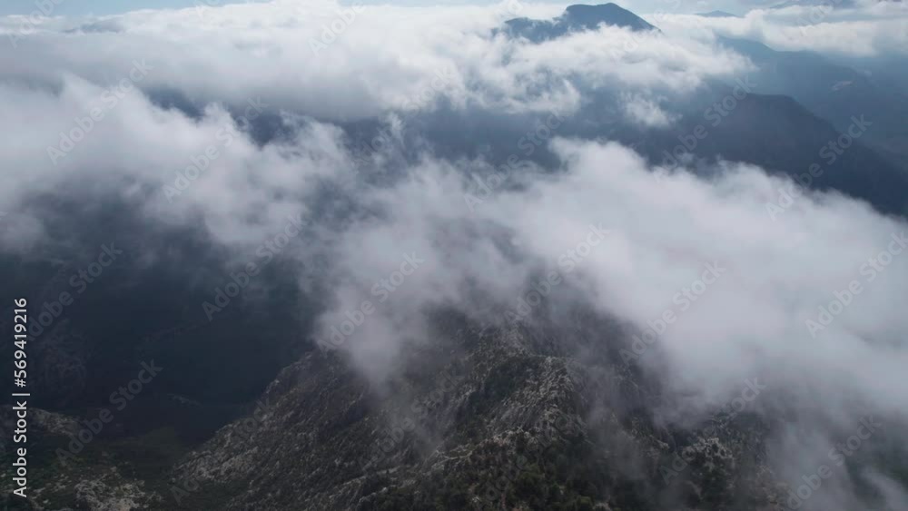 AERIAL drone over misty clouds and mountains, mystical nature of Turkey, thermessos, antalya AERIAL drone over misty clouds and mountains, mystical nature of Turkey, thermessos, antalya