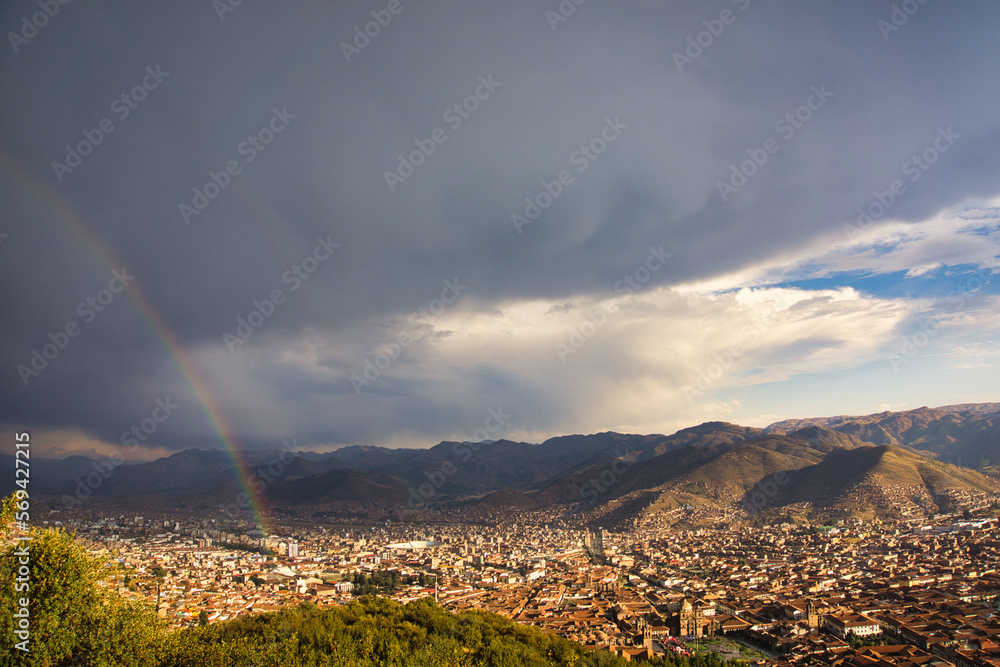Deep-colored rainbow brightens the Inka civilization. 
