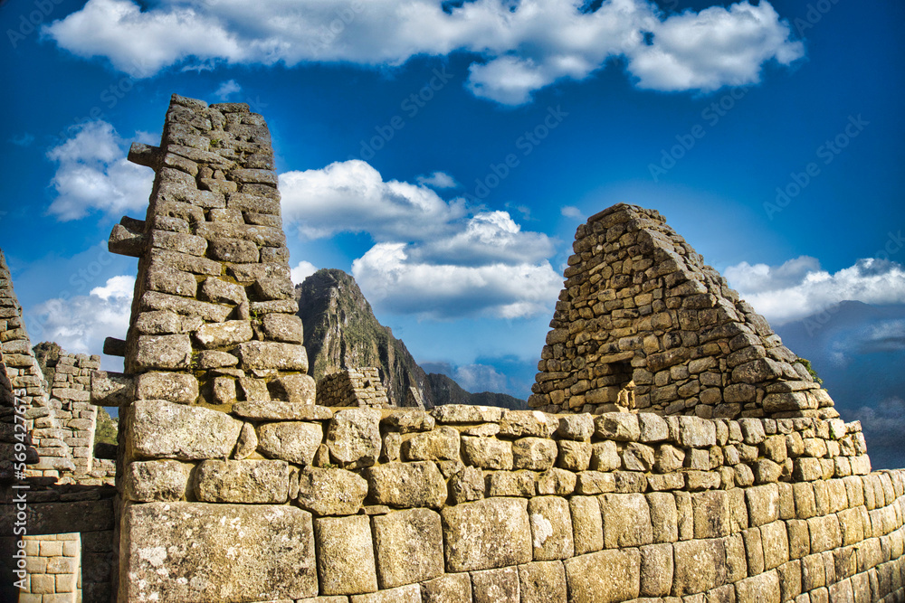 A ruined roof of Machu Picchu. A great history of Inka civilization under the blue sky. It's living evidence showing Inka was such a great civilization. 