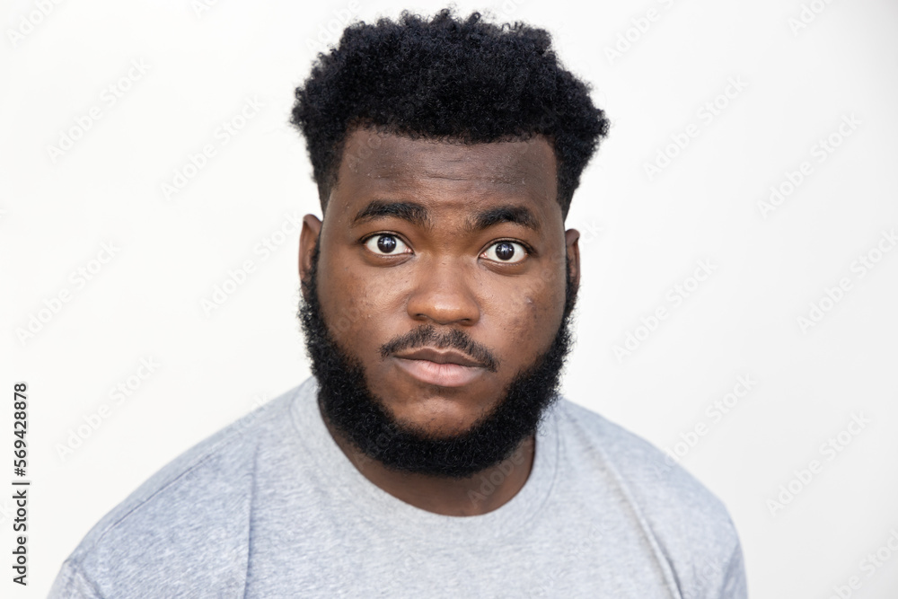 Angry upset Black man staring at you Angry upset Black man staring at you