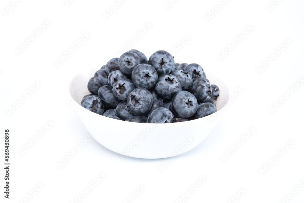 Blueberries in white bowl isolated on white background Blueberries in white bowl isolated on white background