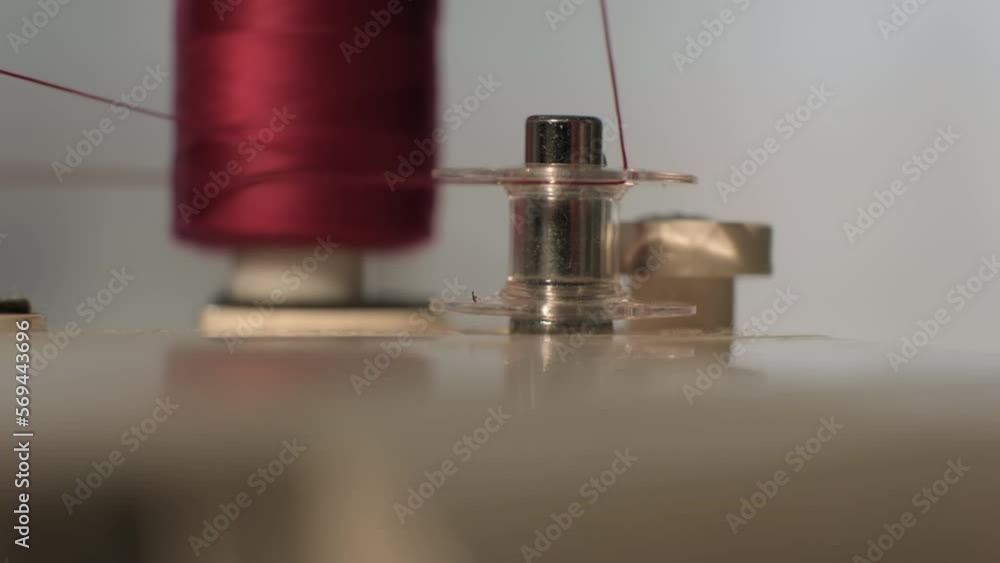 Winding Thread From Rabbit Tailor on sewing machine threads bobbin winding thread from spool close ...