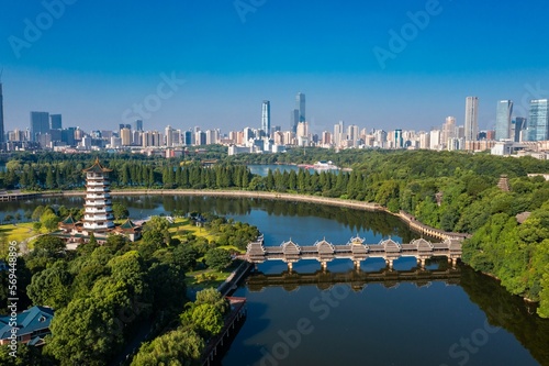 Aerial leap changsha martyrs park lake xiaoxiang pavilion with wind and rain bridge