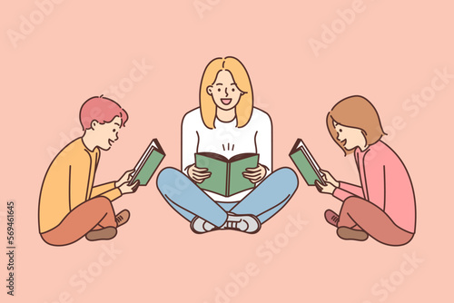 Mom and kids sit on floor with book and enthusiastically read interesting stories