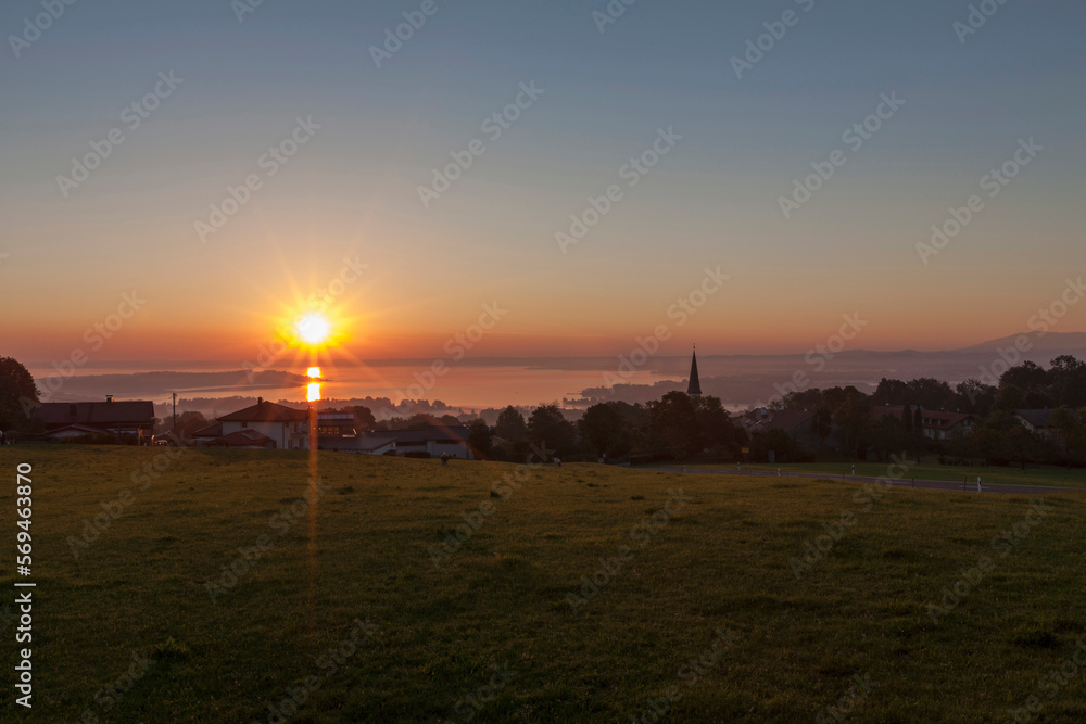 Sunset over Chiemsee lake, Bavaria, Germany Sunset over Chiemsee lake, Bavaria, Germany