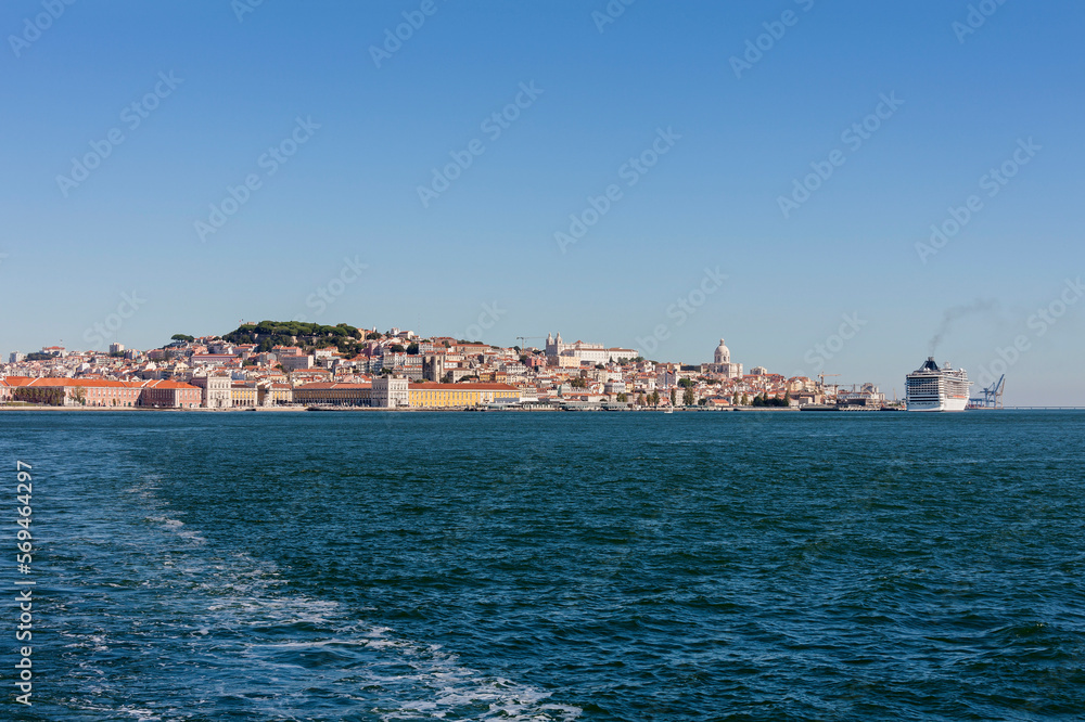 Distant view of city at waterfront, Lisbon, Portugal Distant view of city at waterfront, Lisbon, Portugal