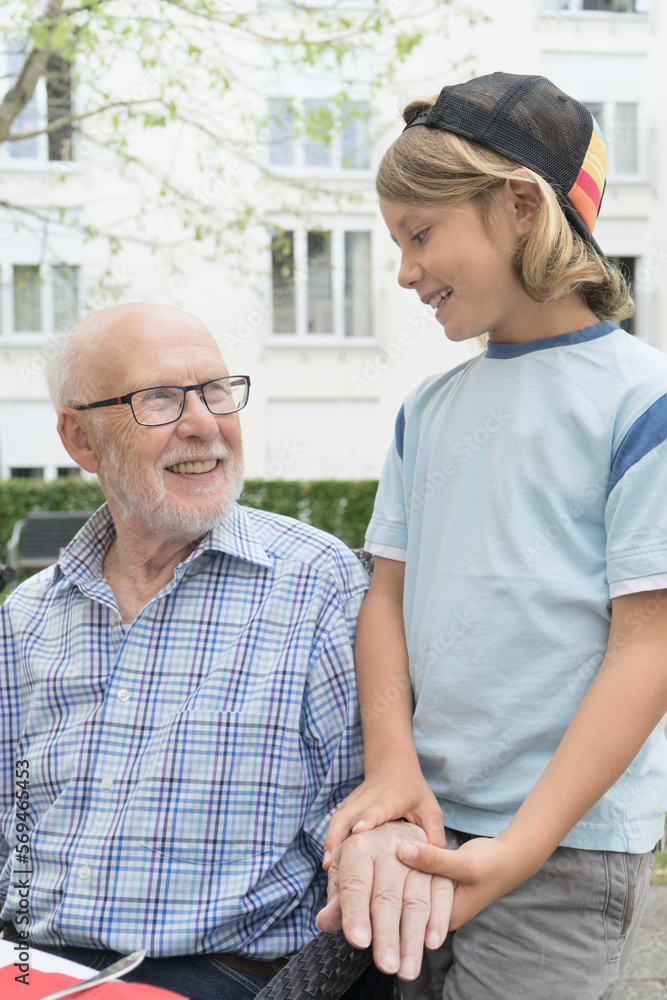 Grandfather with grandson at nursing home Grandfather with grandson at nursing home