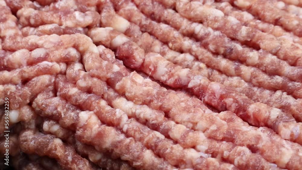 Fresh red pork minced meat circle rotation close up Fresh red pork minced meat circle rotation close up