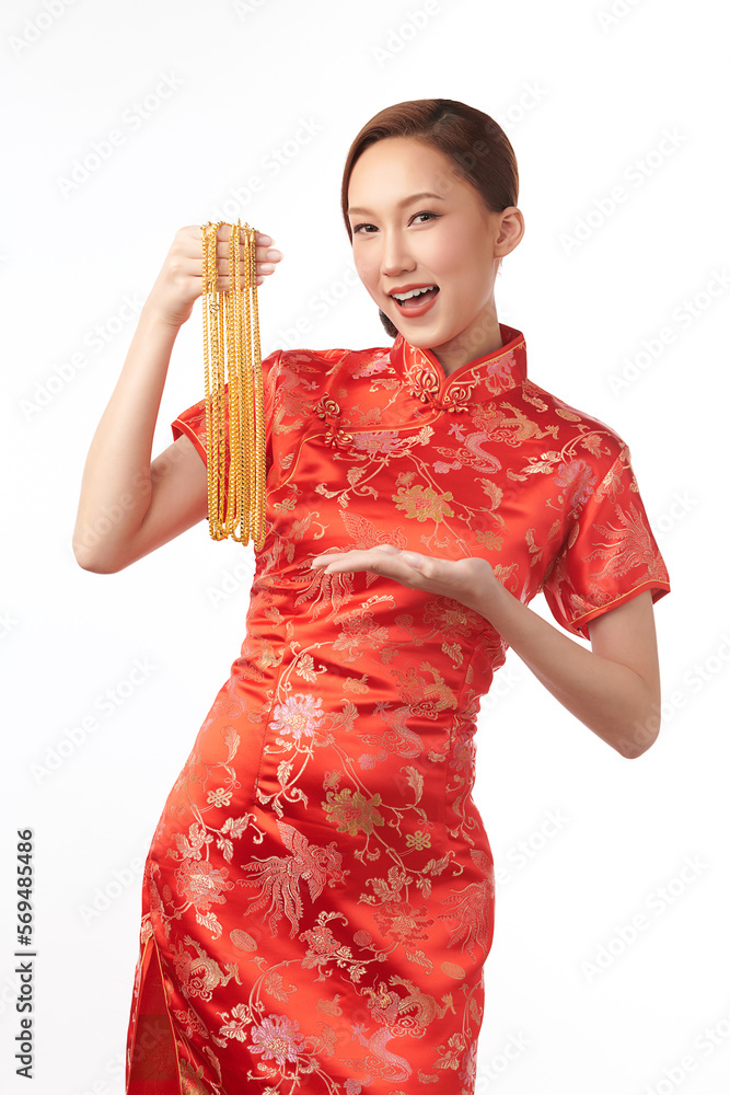 Chinese new year festival, Beautiful Young asian woman wearing traditional cheongsam qipao dress with gold necklaces on white background, Chinese new year festival, Beautiful Young asian woman wearing traditional cheongsam qipao dress with gold necklaces on white background,
