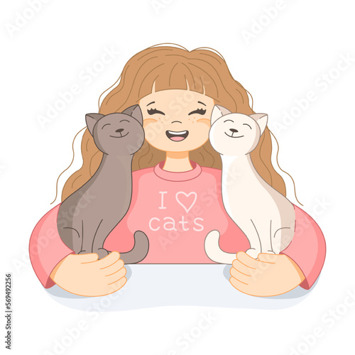 A girl cuddles her favorite cats