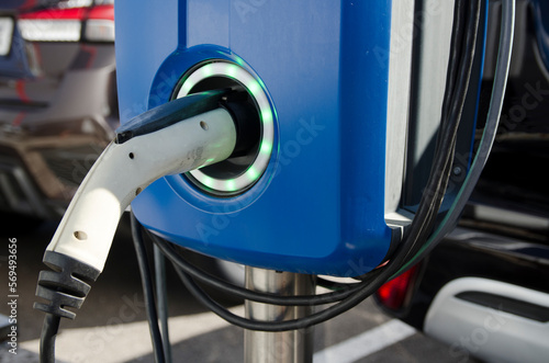 EV Car or Electric vehicle at charging station cable © Cavan