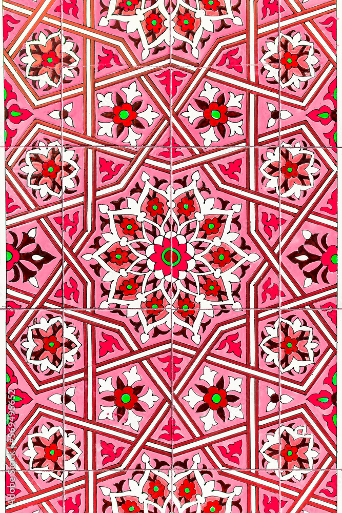 traditional Uzbek pattern on the ceramic tile on the wall of the mosque, background